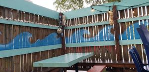 Outside seating. Look at those seashells! 👀 at Indigo Coastal Shanty in Brunswick