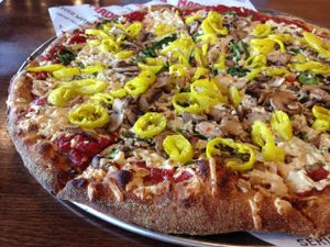 Uncle Maddio's Pizza Joint Dulles 28 Centre, VA USA - Build-your-own pizza with wheat crust, daiya cheese, spinach, mushrooms, and banana peppers. at Uncle Maddio's Pizza Joint in Sterling