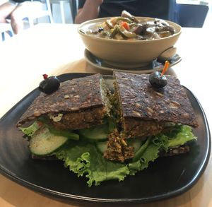 veggie burger sandwich on house-made flax ";bread"; at Nut Tree Cafe in North Vancouver