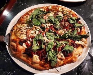 Vegan pizza at Salvatore's...so yummy! Tomato sauce, spinach, sun-dried tomatoes, artichoke hearts, and vegan ricotta. Their vegan ricotta is SO good. at Salvatore's  in Halifax