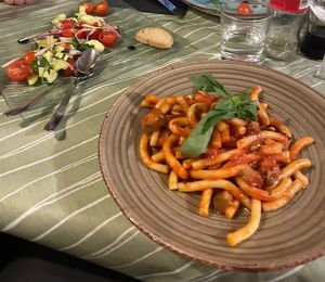 Aubergine and tomato pasta with Sicilian salad  at La Zagara in Taormina