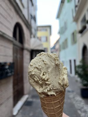 Vegan pistachio gelato in vegan cone  at Gelateria al Pozzo in Riva Del Garda