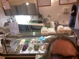 Here is a glance at the delicious saladbar.... Just look behind my bold head at Country Life Restaurant in Prague