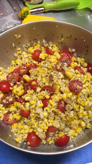 Summer corn salad with local sweet corn, cherry tomatoes , onions, basil, vinegar, olive oil. at Seasons' Eatings in Napoleon