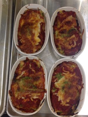 Individual spinach lasagna; three-cheese, plus carrots, onions, garlic & fresh local spinach, with tomato basil sauce.   at Seasons' Eatings in Napoleon