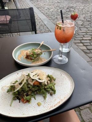 Bruschetta, tempeh sticks w/ peanut sauce and a strawberry lemonade with vodka. Sooo good! at simpleRAW in Copenhagen