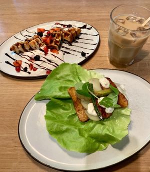 Smørrebrød with tempeh and dessert waffles with cream and berries. SO good!  at simpleRAW in Copenhagen