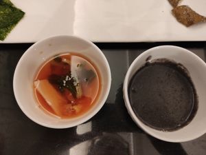 Cold kimchi soup and warm black sesame soup at SanChon Korean Temple Cooking - 산촌 사찰음식전문점 in Seoul