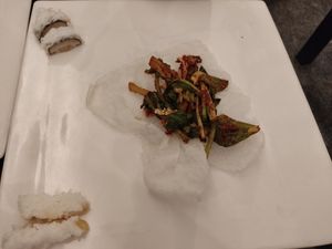 Starter plate 3: Vegetables on the corners with something on them, spiced and stir fried greens on a big rice cracker at SanChon Korean Temple Cooking - 산촌 사찰음식전문점 in Seoul