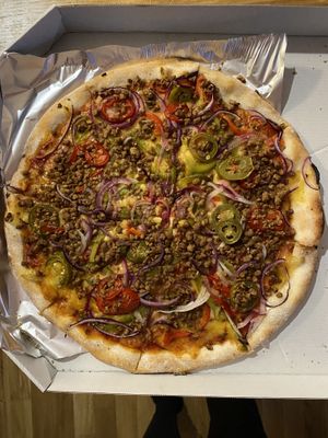 Pizza Vege bolognese with vegan cheese and extra jalapeños.  at Tottapizza in Maribor