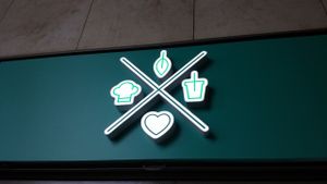 Coox' logo. at Coox in Turin