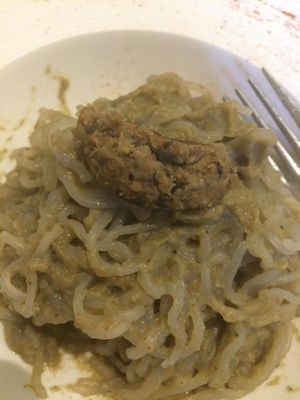 Vegan low-calorie (mooli?) pasta with mushroom sauce and one of the seitan balls on top. at Coox in Turin