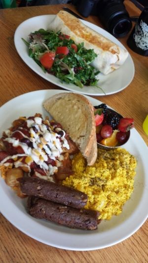 Deluxe Breakfast (with ";supreme"; home fries) and Breakfast Burrito with salad. at D-Beatstro in Toronto