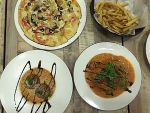 BBQ Chicken pizza, they add more cheese here than at Sin Ming?

Truffle fries, comes with vegan parmesan. Very yummy :) at Brownice Italian Bistro in East Singapore