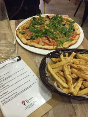 Vegan pizza and cheese fries  at Brownice Italian Bistro in East Singapore