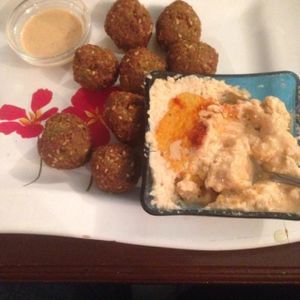 FALAFELZONE 
Best home cooked delicacies falafel in falafelzone...open kitchen, the menu includes vegetarian, vegan, and raw options. Gluten-free bread ,vegan burger buns that is served at Falafelzone.Flavored with spices and herbs and usually served in pita or a wrap or dishes, the best are crispy on the outside and served so hot that steam rises from the soft center as you take your first bite.The ingredients are fresh and the falafels are flavored and cooked to crispy perfection.All spices are coming from Egypt ...

Falafel zone stands in the heart of Beyoğlu, just a stone's throw from istiklal street. The restaurant has quickly become a favorite among vegetarians and vegans, foreigners and locals alike. If you are looking for an on-the-go lunch and want something different from the fresh food and tasty dishes about falafel and vegetable rolls, Falafel zone is a perfect solution.As soon as you enter the Istiklal Street, you will start enjoying a little walk down,There are also tables outside the restaurant on a traffic barred street which is full of other cafes and restaurants.Whenever you are hungry or rewctant to cook at home, it is almosy possible to find the comfort of your home in Falafelzone.

TEL: 0212 251 13 23
http://falafelzone.blogspot.com
e-mail:falafelzoneistanbul@gmail.com
adres:FALAFELZONE
istiklal caddesi öğüt sok no:4 Taksim-istanbul at Falafel Zone in Istanbul