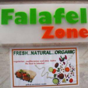 FALAFELZONE 
Best home cooked delicacies falafel in falafelzone...open kitchen, the menu includes vegetarian, vegan, and raw options. Gluten-free bread ,vegan burger buns that is served at Falafelzone.Flavored with spices and herbs and usually served in pita or a wrap or dishes, the best are crispy on the outside and served so hot that steam rises from the soft center as you take your first bite.The ingredients are fresh and the falafels are flavored and cooked to crispy perfection.All spices are coming from Egypt ...

Falafel zone stands in the heart of Beyoğlu, just a stone's throw from istiklal street. The restaurant has quickly become a favorite among vegetarians and vegans, foreigners and locals alike. If you are looking for an on-the-go lunch and want something different from the fresh food and tasty dishes about falafel and vegetable rolls, Falafel zone is a perfect solution.As soon as you enter the Istiklal Street, you will start enjoying a little walk down,There are also tables outside the restaurant on a traffic barred street which is full of other cafes and restaurants.Whenever you are hungry or rewctant to cook at home, it is almosy possible to find the comfort of your home in Falafelzone.

TEL: 0212 251 13 23
http://falafelzone.blogspot.com
e-mail:falafelzoneistanbul@gmail.com
adres:FALAFELZONE
istiklal caddesi öğüt sok no:4 Taksim-istanbul at Falafel Zone in Istanbul