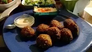 FALAFELZONE 
Best home cooked delicacies falafel in falafelzone...open kitchen, the menu includes vegetarian, vegan, and raw options. Gluten-free bread ,vegan burger buns that is served at Falafelzone.Flavored with spices and herbs and usually served in pita or a wrap or dishes, the best are crispy on the outside and served so hot that steam rises from the soft center as you take your first bite.The ingredients are fresh and the falafels are flavored and cooked to crispy perfection.All spices are coming from Egypt ...

Falafel zone stands in the heart of Beyoğlu, just a stone's throw from istiklal street. The restaurant has quickly become a favorite among vegetarians and vegans, foreigners and locals alike. If you are looking for an on-the-go lunch and want something different from the fresh food and tasty dishes about falafel and vegetable rolls, Falafel zone is a perfect solution.As soon as you enter the Istiklal Street, you will start enjoying a little walk down,There are also tables outside the restaurant on a traffic barred street which is full of other cafes and restaurants.Whenever you are hungry or rewctant to cook at home, it is almosy possible to find the comfort of your home in Falafelzone.

TEL: 0212 251 13 23
http://falafelzone.blogspot.com
e-mail:falafelzoneistanbul@gmail.com
adres:FALAFELZONE
istiklal caddesi öğüt sok no:4 Taksim-istanbul at Falafel Zone in Istanbul