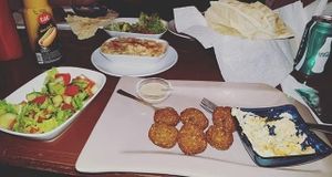 FALAFELZONE 
Best home cooked delicacies falafel in falafelzone...open kitchen, the menu includes vegetarian, vegan, and raw options. Gluten-free bread ,vegan burger buns that is served at Falafelzone.Flavored with spices and herbs and usually served in pita or a wrap or dishes, the best are crispy on the outside and served so hot that steam rises from the soft center as you take your first bite.The ingredients are fresh and the falafels are flavored and cooked to crispy perfection.All spices are coming from Egypt ...

Falafel zone stands in the heart of Beyoğlu, just a stone's throw from istiklal street. The restaurant has quickly become a favorite among vegetarians and vegans, foreigners and locals alike. If you are looking for an on-the-go lunch and want something different from the fresh food and tasty dishes about falafel and vegetable rolls, Falafel zone is a perfect solution.As soon as you enter the Istiklal Street, you will start enjoying a little walk down,There are also tables outside the restaurant on a traffic barred street which is full of other cafes and restaurants.Whenever you are hungry or rewctant to cook at home, it is almosy possible to find the comfort of your home in Falafelzone.

TEL: 0212 251 13 23
http://falafelzone.blogspot.com
e-mail:falafelzoneistanbul@gmail.com
adres:FALAFELZONE
istiklal caddesi öğüt sok no:4 Taksim-istanbul at Falafel Zone in Istanbul