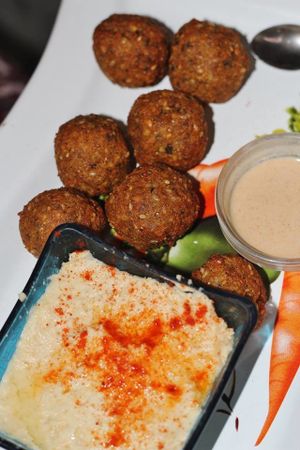 
FALAFELZONE
 Best home cooked delicacies falafel in falafelzone...open kitchen, the menu includes vegetarian, vegan, and raw options. Gluten-free bread ,vegan burger buns that is served at Falafelzone.Flavored with spices and herbs and usually served in pita or a wrap or dishes, the best are crispy on the outside and served so hot that steam rises from the soft center as you take your first bite.The ingredients are fresh and the falafels are flavored and cooked to crispy perfection.All spices are coming from Egypt ...
TEL: 0212 251 13 23
http://falafelzone.blogspot.com
e-mail:falafelzoneistanbul@gmail.com
adres:FALAFELZONE
istiklal caddesi öğüt sok no:4 Taksim-istanbul at Falafel Zone in Istanbul