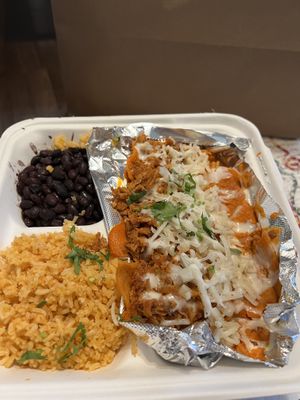 Red Chilaquiles with Vegan Sauce, Sour Cream, Cheese, and Carnitas  at Gringo A Go Go in Raleigh