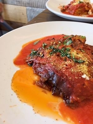 MELANZANA ALLA PARMIGIANA (GF) --Traditional Italian Eggplant Parmigiana with Smoked vegan Mozzarella.

Follow @mrvegan_in_sandiego for more delicious vegan food photos.  at Civico 1845 in San Diego