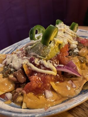 Nacho supreme — showstopper!! 😍  at The Burrowing Owl in Colorado Springs