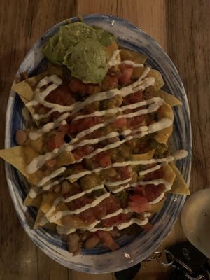 Nacho supreme - minus onions and jalapeños   at The Burrowing Owl in Colorado Springs