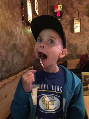 Enjoying the salted Carmel ice cream popsicle! at The Burrowing Owl in Colorado Springs