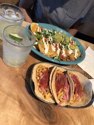 Ranch nachos, Mac and cheese tacos, Coconut Sap and Masked Owl cocktails at The Burrowing Owl in Colorado Springs