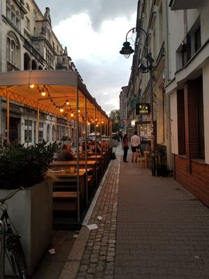 Outdoor seating at Ahimsa Vegan Restaurant and Club in Wroclaw