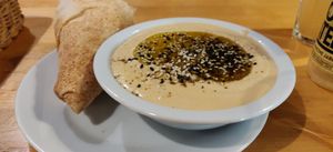 Oily thick hummus at Ahimsa Vegan Restaurant and Club in Wroclaw