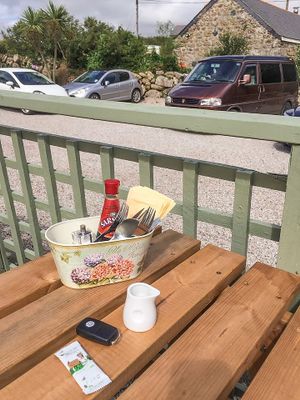 Apple Tree Vegan Friendly Cafe outdoor Seating area (and my VDub Campervan)  at Apple Tree Cafe in Trevescan