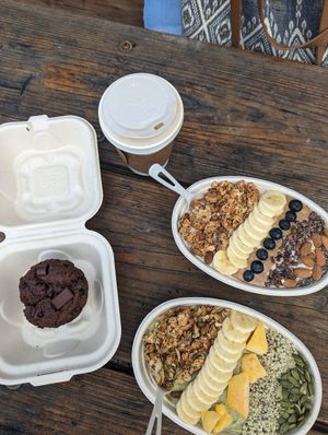 PB and chocolate muffin, mocha latte, energizer bowl with blueberries, and green bowl (all vegan!!) at Finn's Island Style Grub in Panama City Beach