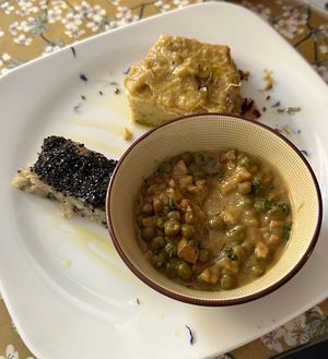 Polenta and tempeh/veggie dish with baked sweet potato   at Fram Cafe in Bologna