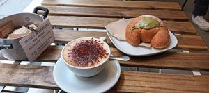Cappuccino di avena e brioche con crema di pistacchio at Fram Cafe in Bologna