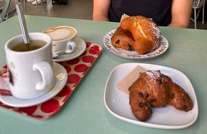 The, cappuccino di soia, pan brioche con gocce di cioccolato, pan brioche con crema al pistacchio e pan au chocolat   at Fram Cafe in Bologna