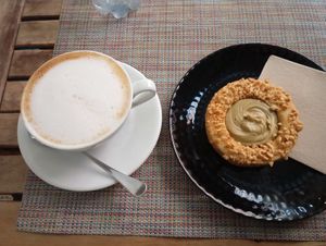 This tahini cookie with a pistachio cream filling is heavenly. Might be my favorite thing here. at Fram Cafe in Bologna