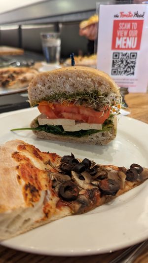 1/2 Vegan Sandwich and Pizza w/o cheese + mushrooms & black olives at The Tomato Head - Gallery Shopping Ctr in Knoxville