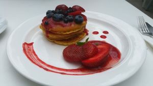 Good looking and tasting pancakes and red fruits at Think Love Juices & Vegan Food in Warsaw