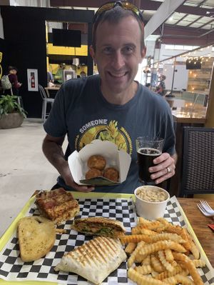 So much variety! All delicious 🤩 Lasagna, garlic bread, fried cheeze bites, crunch wrap, fries & beer!!  at V-Grits Food Truck in Louisville
