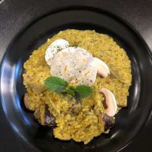 Mushroom and curcuma risotto at O'Vita in Parma