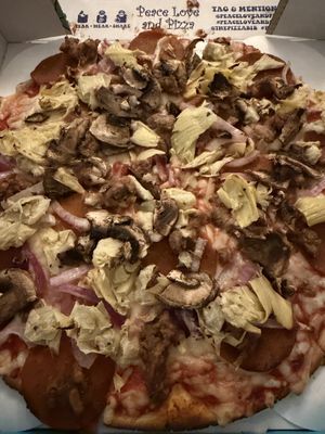 Vegan pizza with vegan sausage and vegan pepperoni   at Peace Love and Pizza - East Cobb in Marietta