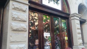 paintings in the window at VSpot Express in New York City