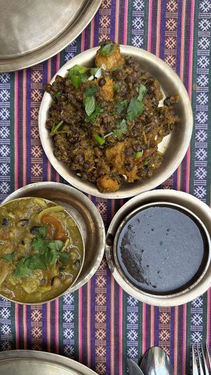 Sides- black Dahl, channa (squash/black chickpeas) and ?   at Yak Yeti Yak in Bath