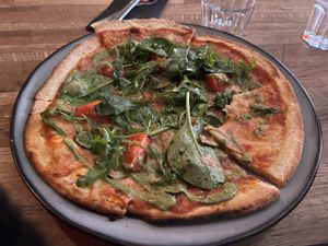 Eat Your Veggies pizza (amazing dressing)  at Crippas Cafe in Gothenburg