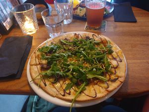 Pizza blanc with caramelised onions and arugula. at Crippas Cafe in Gothenburg