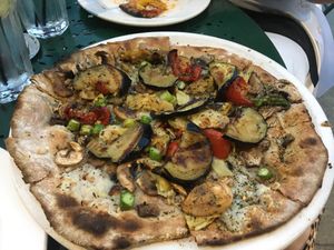 Four seasons pizza with added eggplant on wheat crust and made vegan  at Louisiana Pizza Kitchen in New Orleans