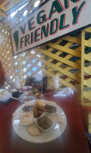 Falafel platter, spring rolls, pine colada, rice bowl at Chile Rojo in Puerto Viejo De Talamanca