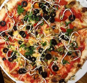 Vegan pizza at Kavarna Klubu Cross in Prague